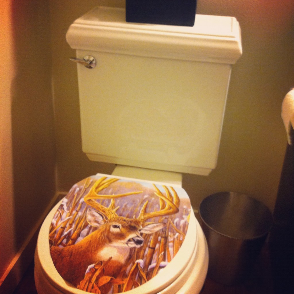 a deer head on my toilet via @jennyonthespot |jennyonthespot.com
